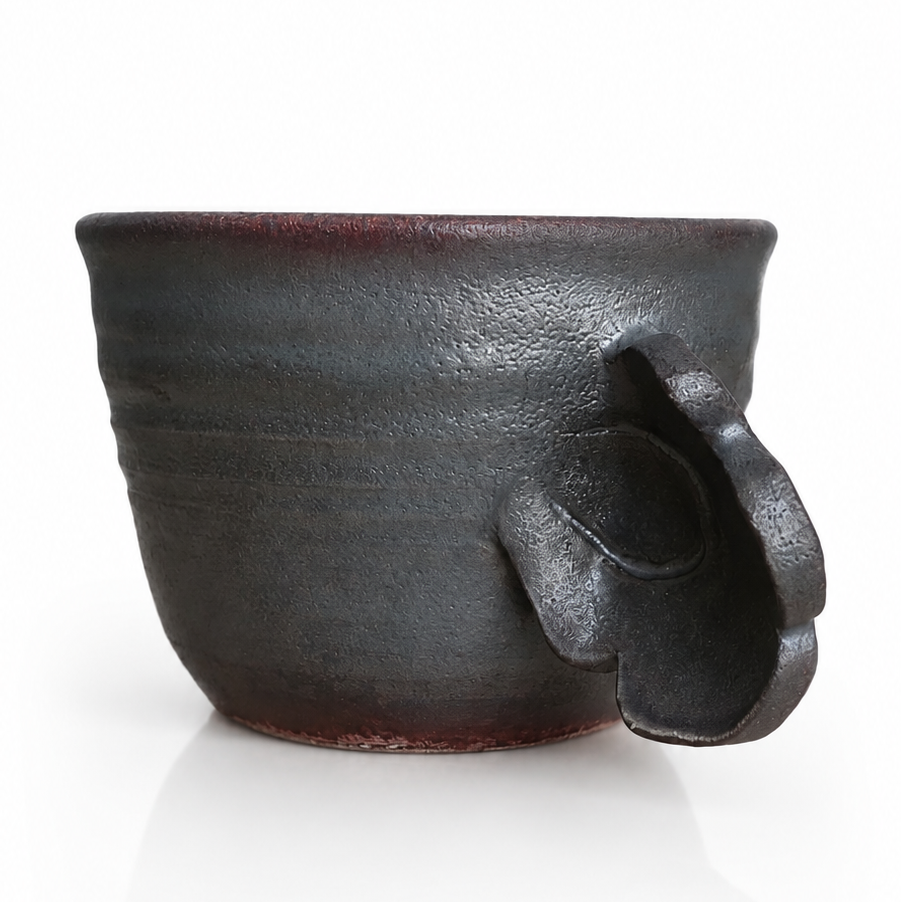 Black ceramic Japanese mug handcrafted in Mashiko