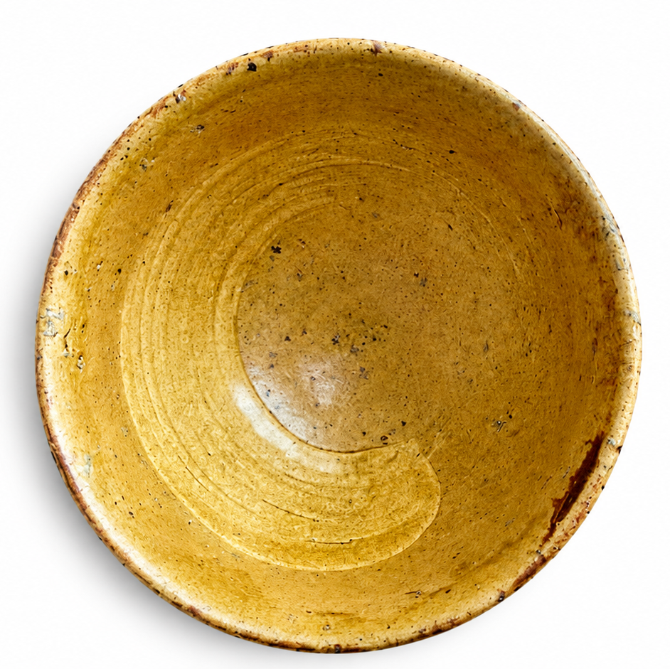 Artisan ceramic tea bowl with warm earthy finish
Traditional Japanese tea ceremony bowl with rustic character