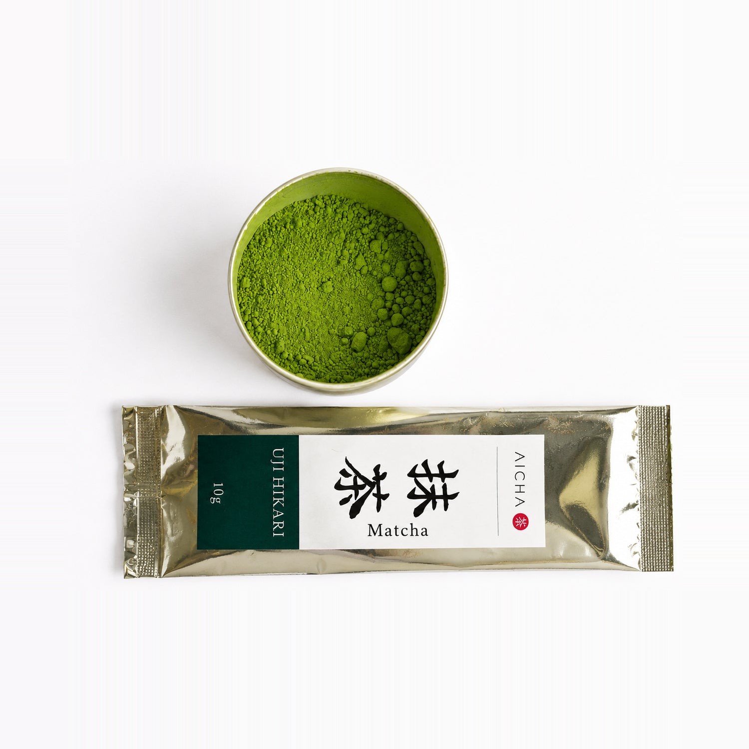 AiCha Uji Hikari 10 g sachet and tin of matcha, overhead