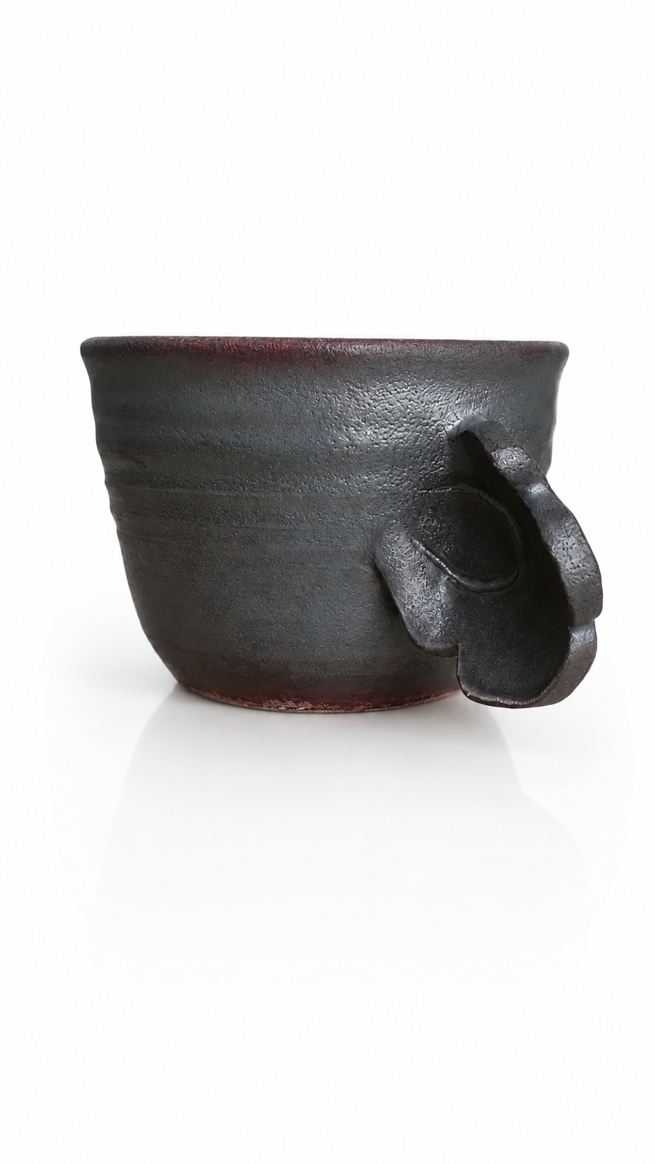 Black ceramic Japanese mug handcrafted in Mashiko