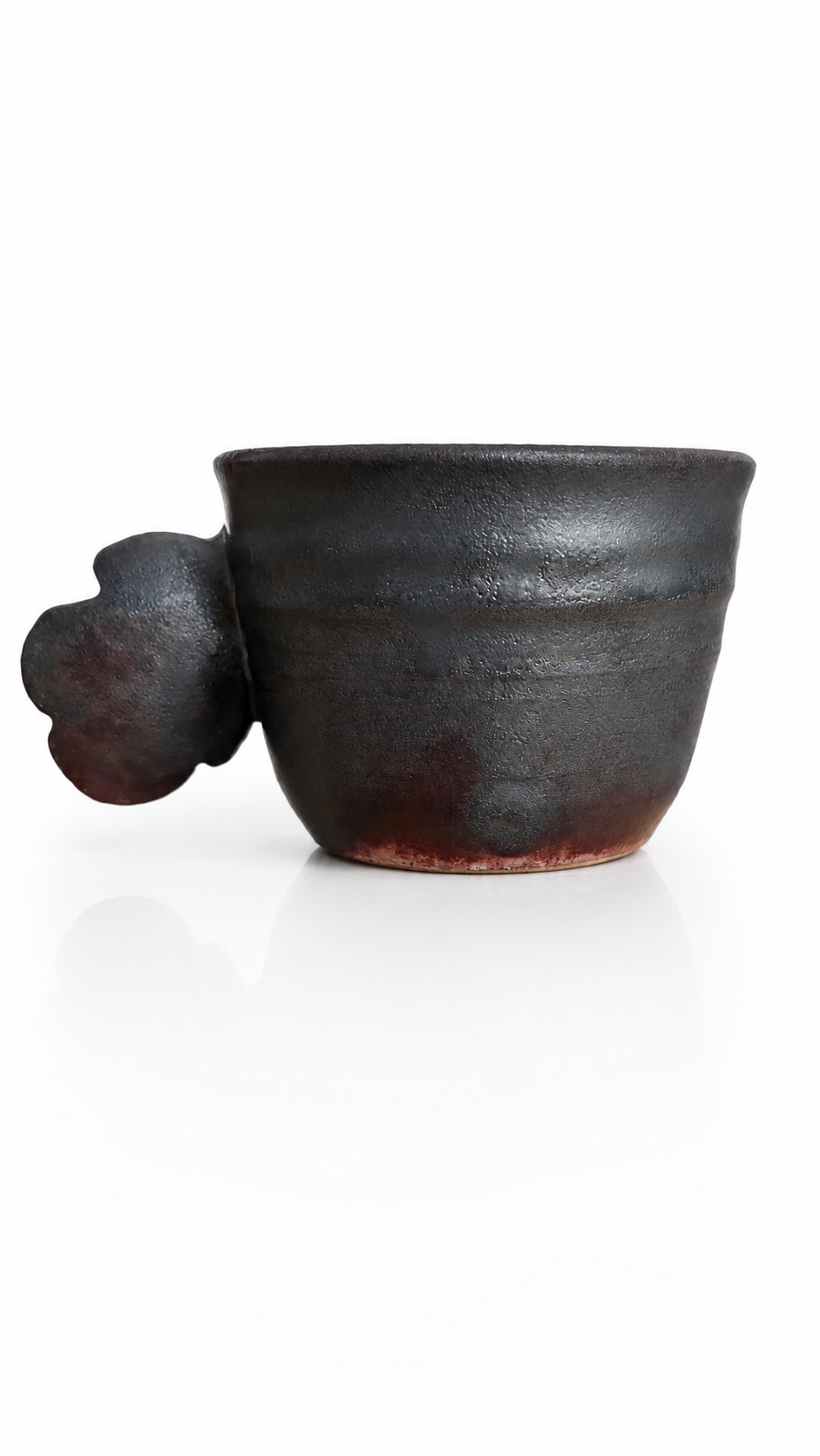 Rustic Japanese tea cup with wabi-sabi aesthetic