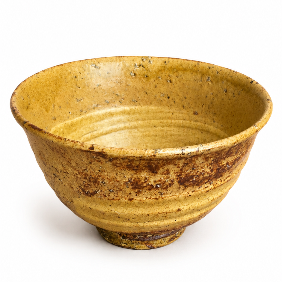 Handcrafted Japanese ceramic matcha bowl with golden ash glaze

Rustic Japanese chawan featuring natural kiln-fired textures