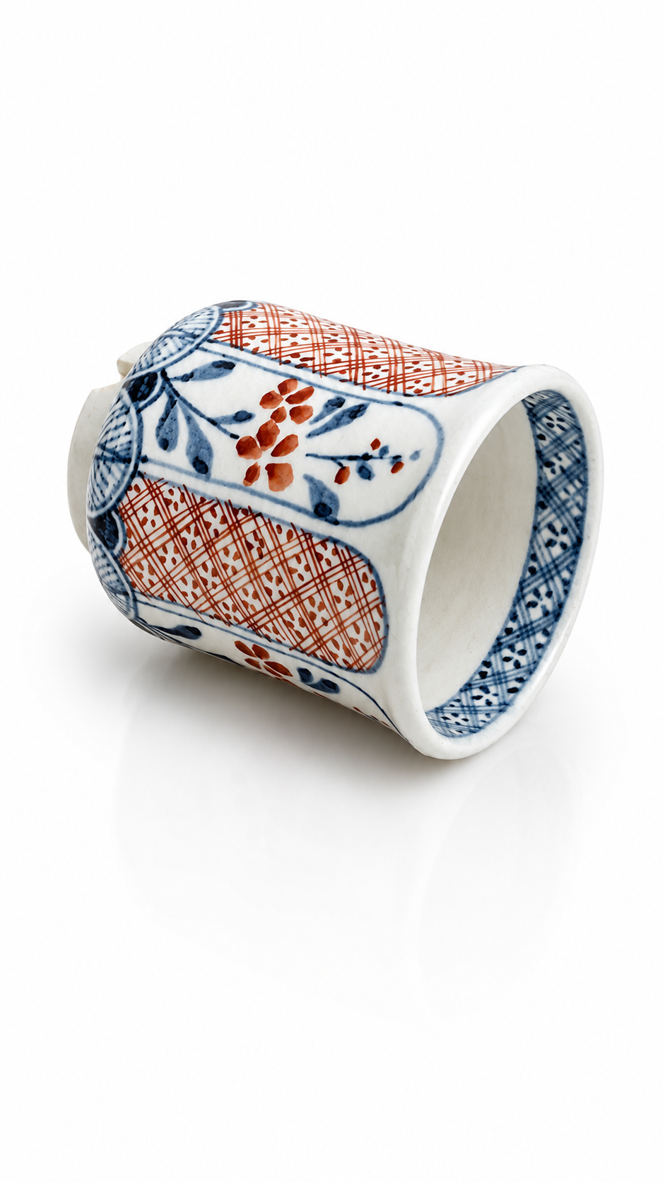 Japanese porcelain yunomi with floral decoration
Handmade Japanese