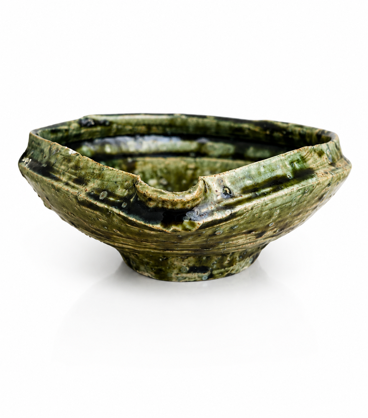 Top view of Japanese katakuchi pouring bowl featuring layered forest-green glaze.