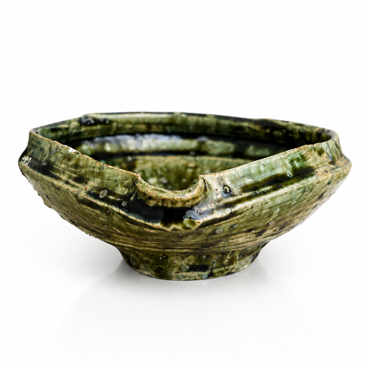 Top view of Japanese katakuchi pouring bowl featuring layered forest-green glaze.