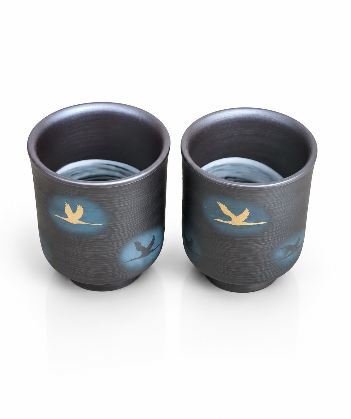 Artisan Japanese pottery tea cup pair
