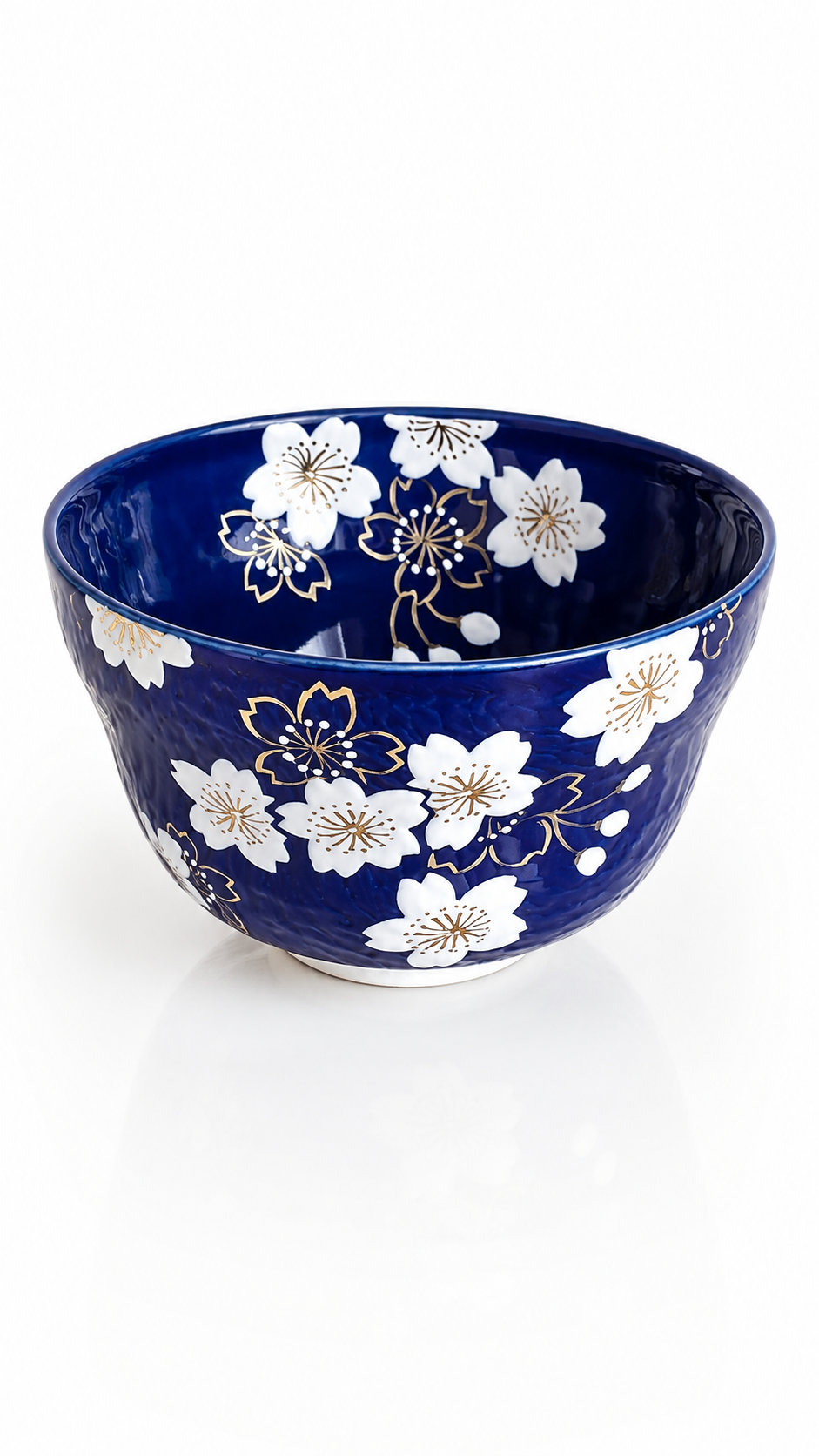 Japanese ceramic tea bowl with gold accents

